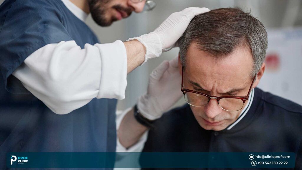 An old man visiting a young male doctor in hair transplantation