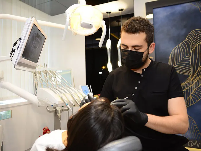 Spc. Dr. Oğuzhan Sunar at Prof Clinic and His Experience in Dental Implants and Periodontal Treatments 2 Dr. Sunar’s Dental Expertise