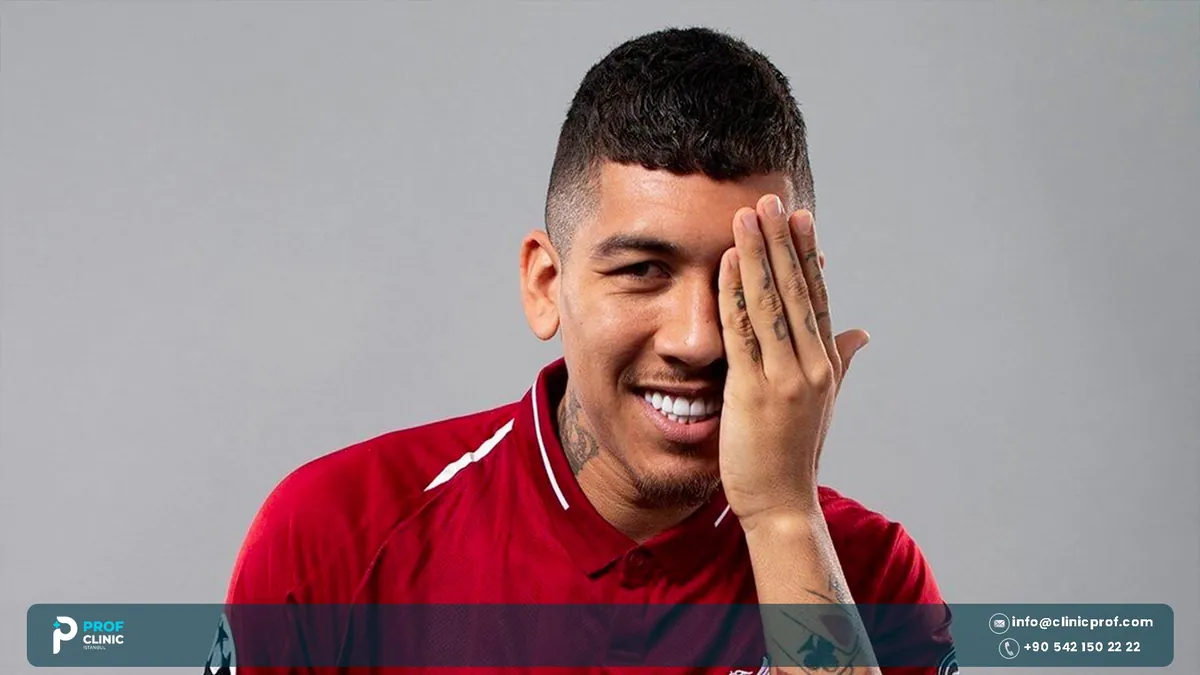 Roberto Firmino teeth in a Liverpool club portrait, smiling
